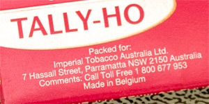 The back cover of a pack of Tally-Ho rolling papers showing the address of Imperial Tobacco Australia and the text "Made in Belgium" clearly on the exterior.